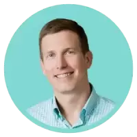 Andrew Miller portrait on a teal background.