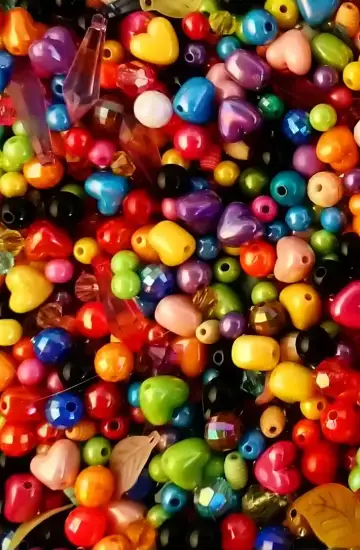 Colorful beads in various shapes, representing product diversity and ecommerce value.