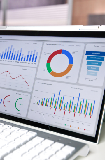 Digital dashboard on a computer screen showing marketing performance charts, representing enhanced attribution measurement.