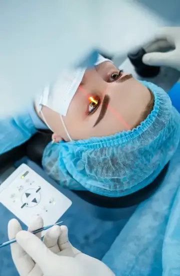 Patient undergoing LASIK eye surgery with a visible laser, symbolizing specialized healthcare marketing results.