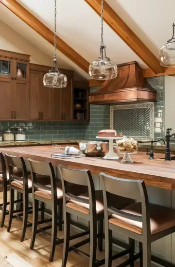 Stylish kitchen with wooden island and pendant lights, representing ROI success for interior design brand Lisman Studio.