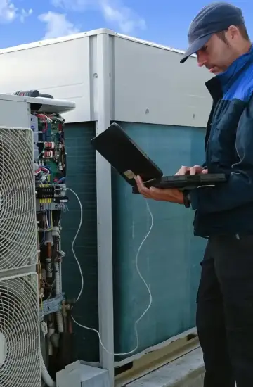 HVAC technician inspecting rooftop units, representing lead generation and digital marketing for service industries.
