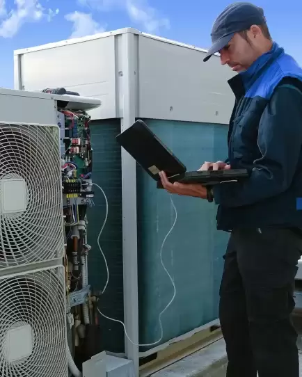 HVAC technician inspecting rooftop units, representing lead generation and digital marketing for service industries.