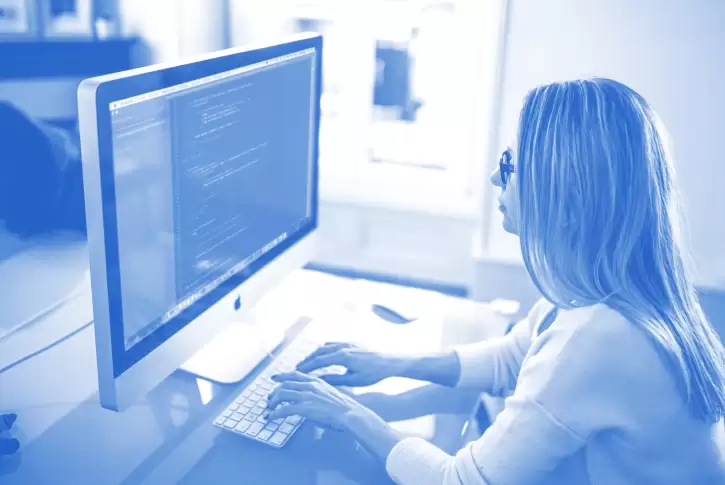 Stylized image of woman working on web design