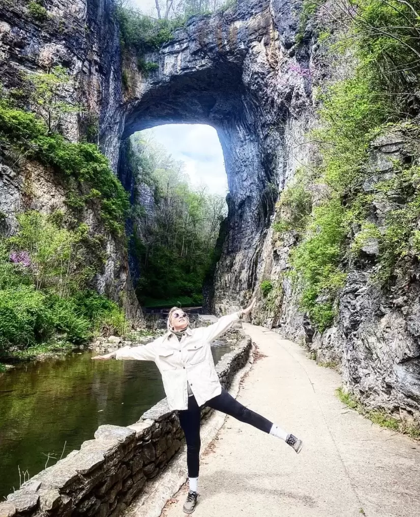 Woman at Natural Bridge in Spring