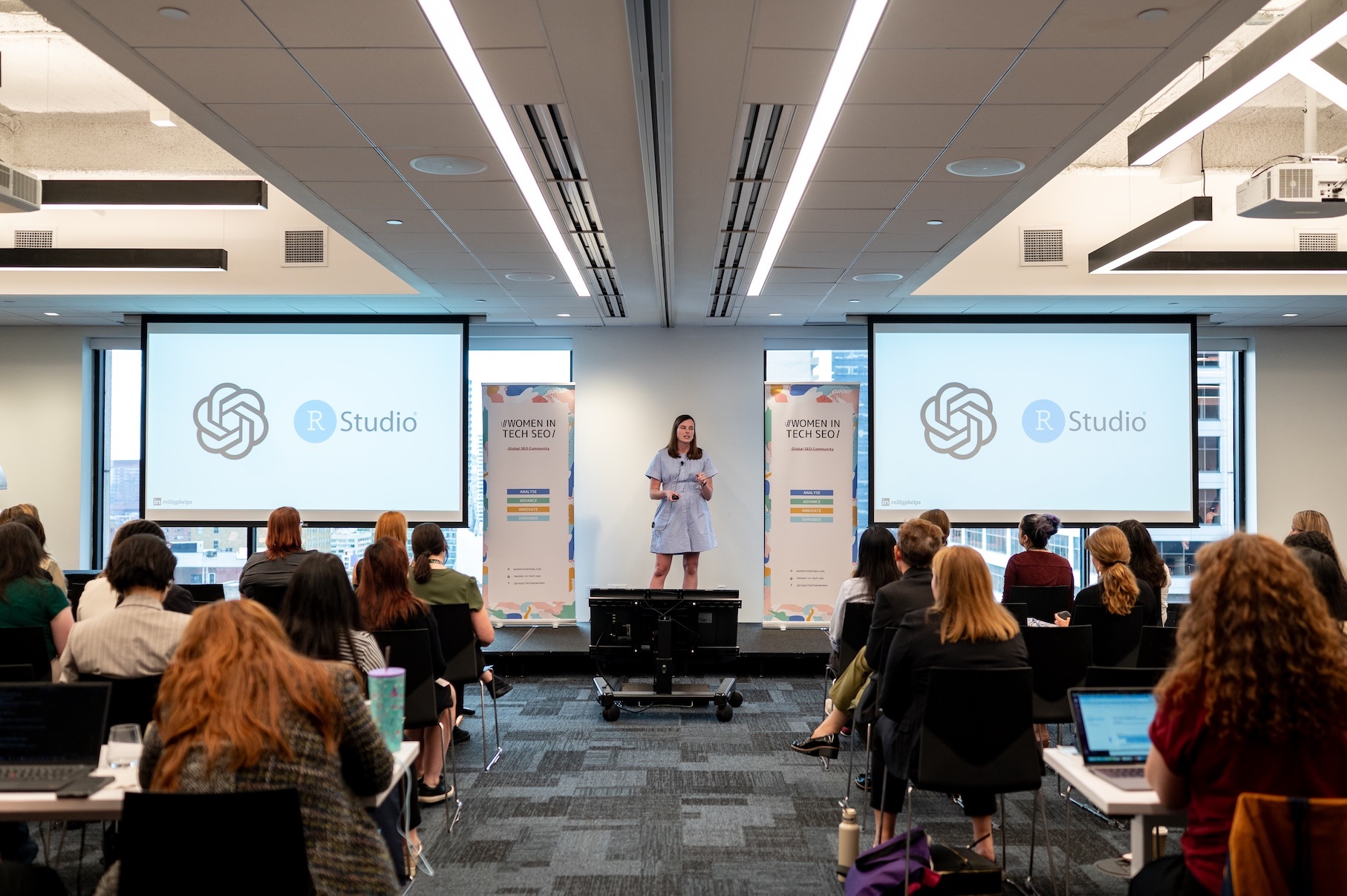 Reilly Phelps on stage speaking at WTSFest Philly in 2025.